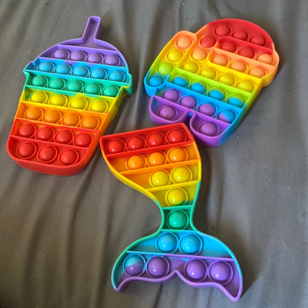 Set of three rainbow pop its